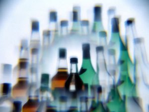 799px-Alcohol_bottles_photographed_while_drunk